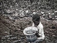 2-IMG 0084 Liberian boy preparing to carry water-